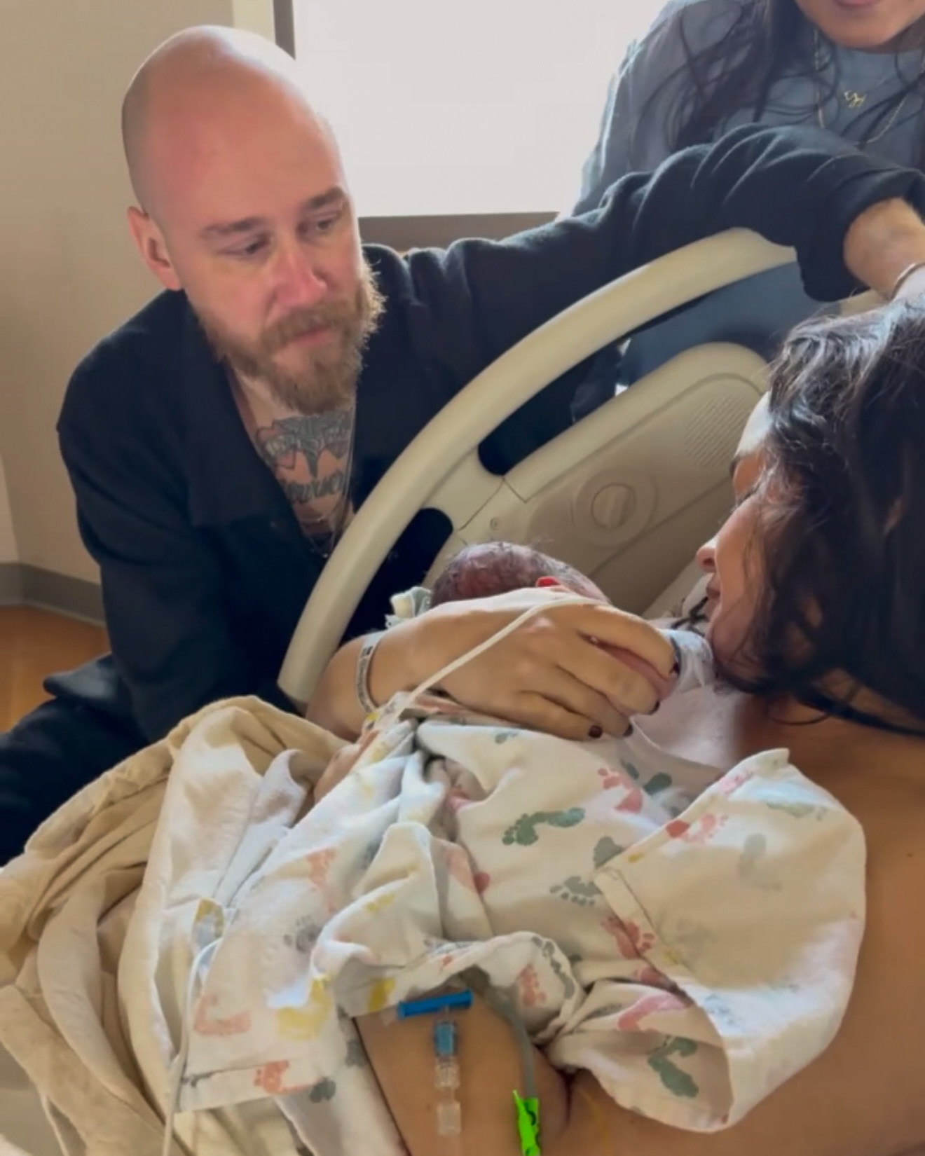 Joshua and Kameesha meeting Richie after her birth
